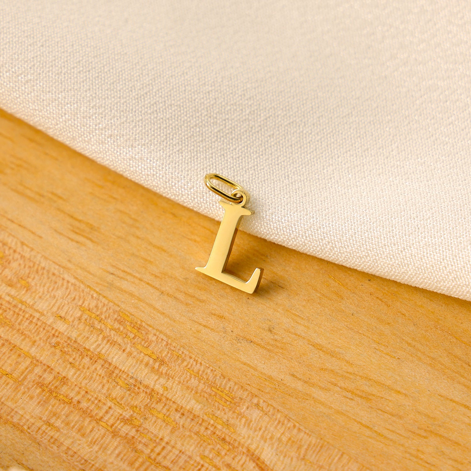 Wholesale Titanium steel letter pendant