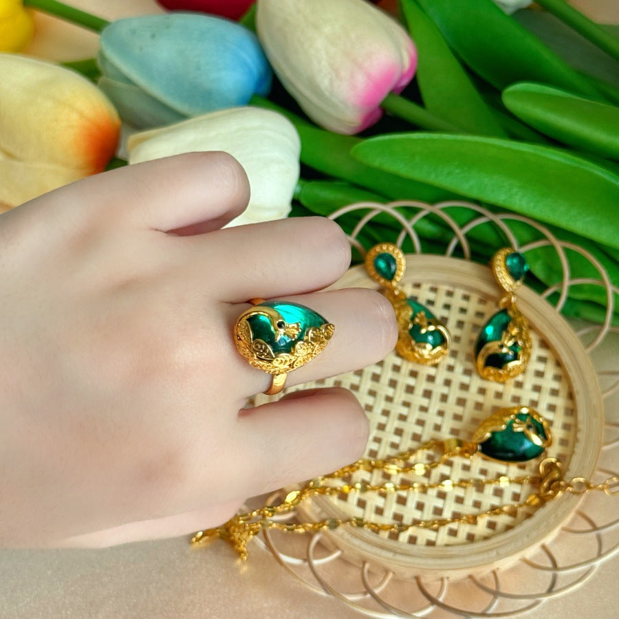 Wholesale gold peacock green crystal pendant water wave chain necklace earrings suit