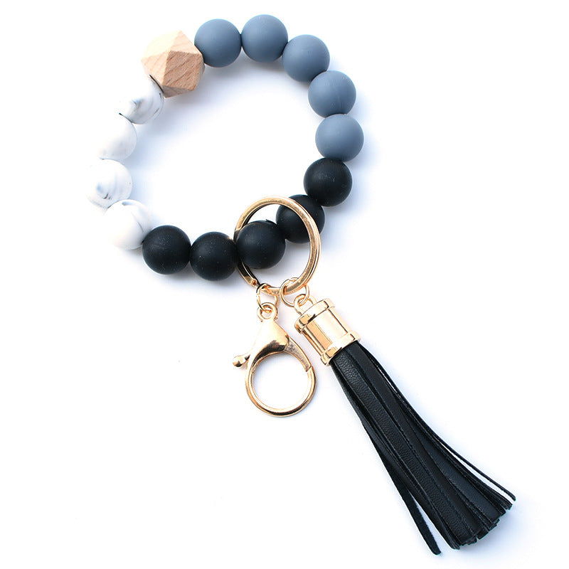 Wholesale Trendy Silicone Bead Bracelet With Tassel Wooden Bead Keychain Natural Geometry Style Chic Jewelry Accessory Gift
