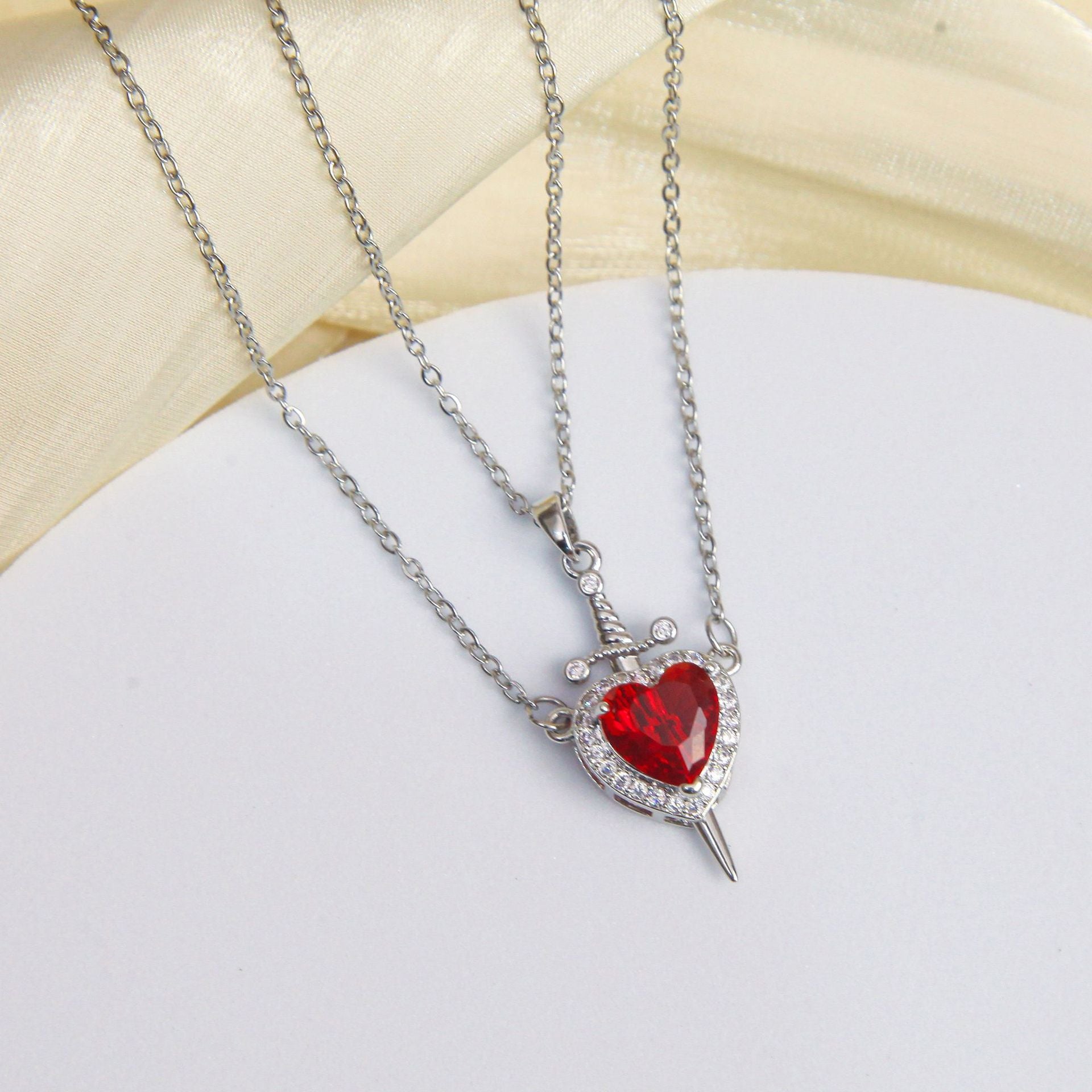 Wholesale  Titanium Steel arrow through the heart necklace copper plated 18K gold red love necklace