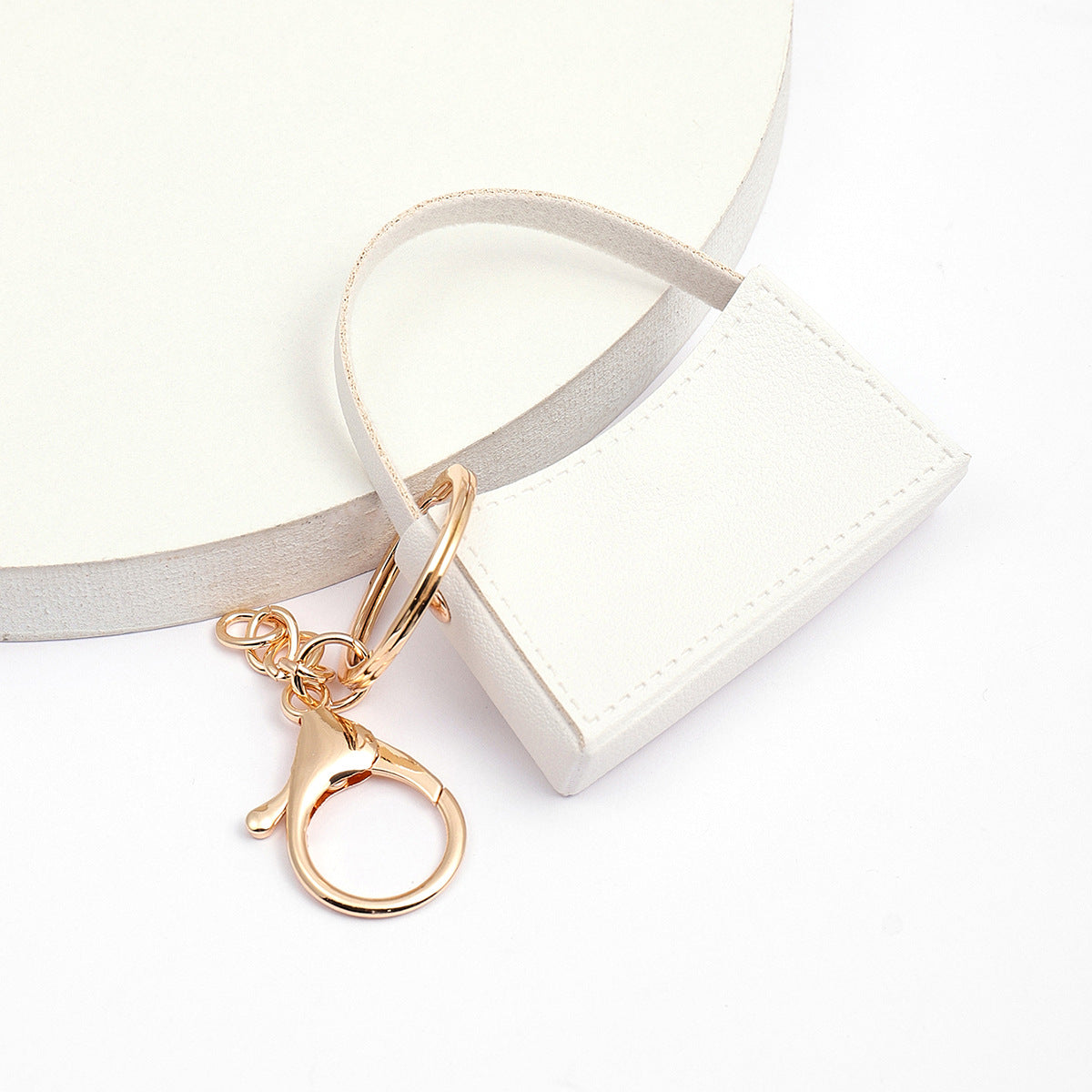 Wholesale Small Curved Bag PU Leather Keychain Pendants ACC-KC-XTZ012