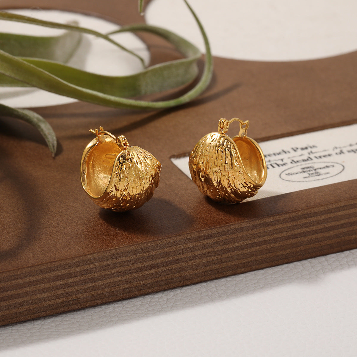 Wholesale Irregular semicircular hammer pattern earrings