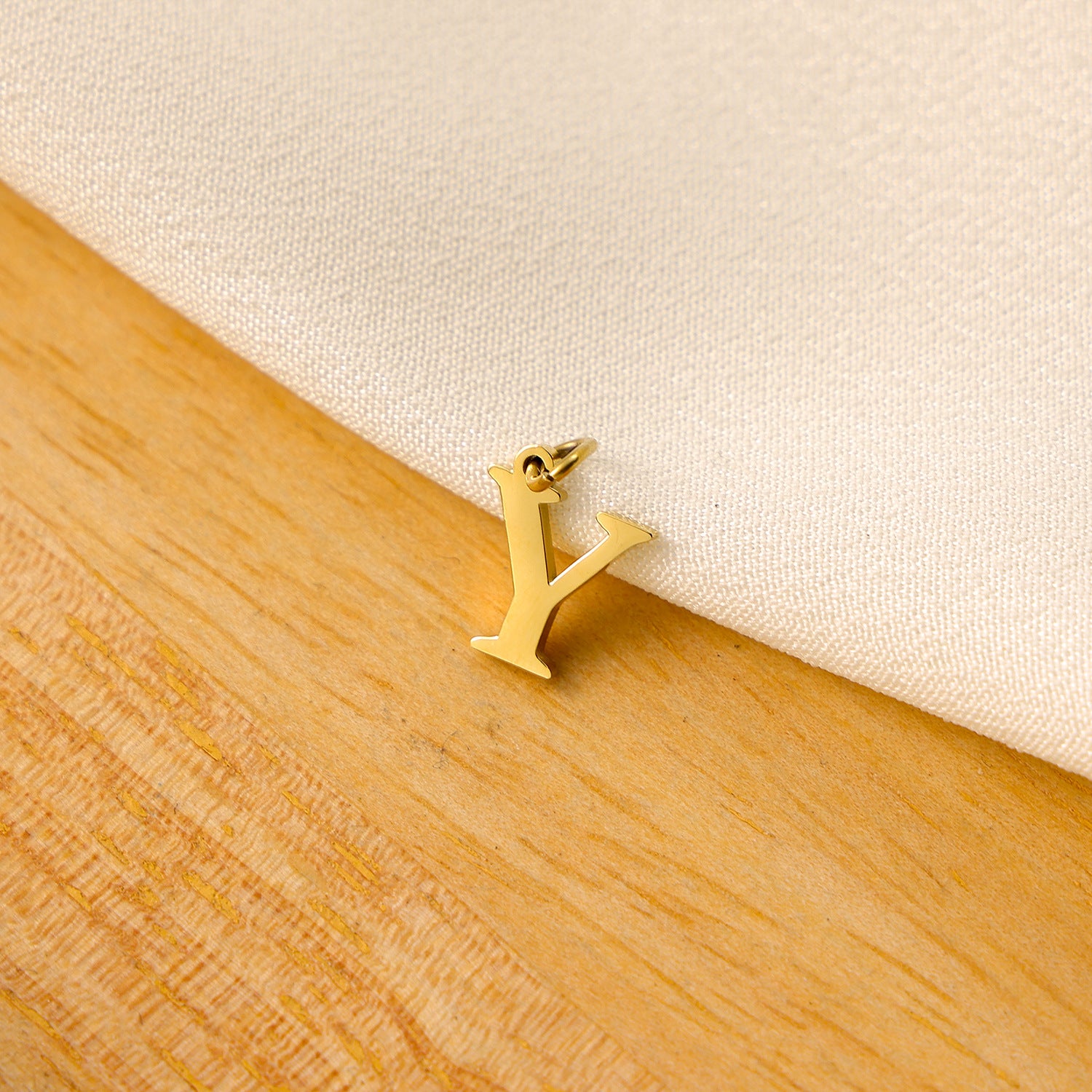 Wholesale Titanium steel letter pendant