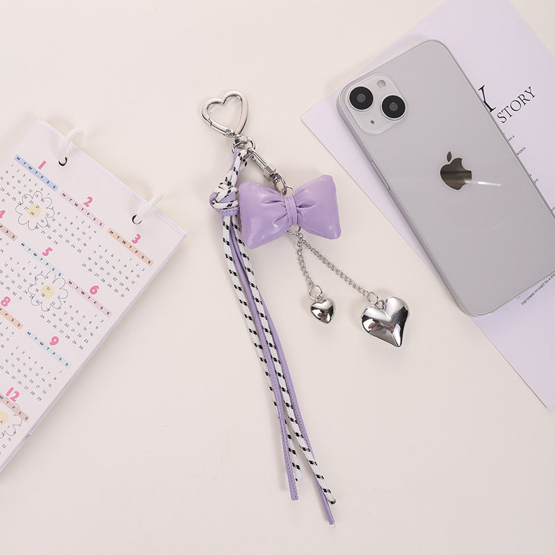 Wholesale Leather cord bow tassel keychain