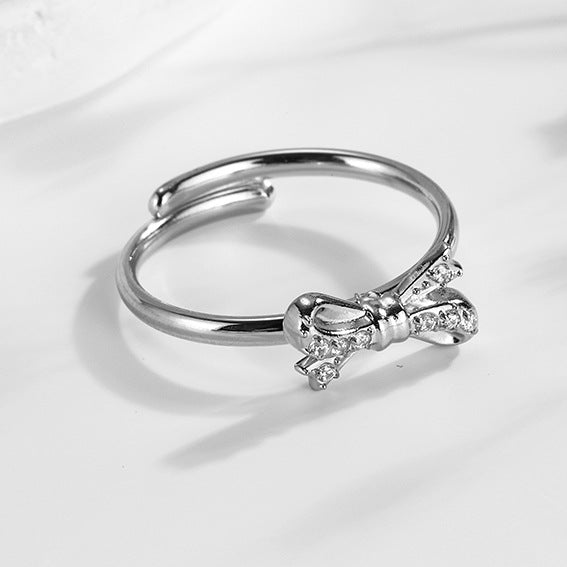 Wholesale 2PCS Steel-titanium bow zircon ring adjustable