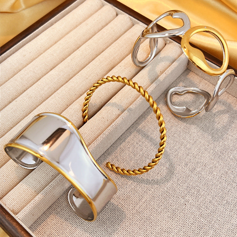Wholesale Stainless Steel Bangle with 18K Metallic Finish and Two-Tone Gold Open Design