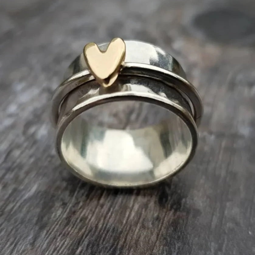 Wholesale two-color heart-shaped rotatable stress relief ring