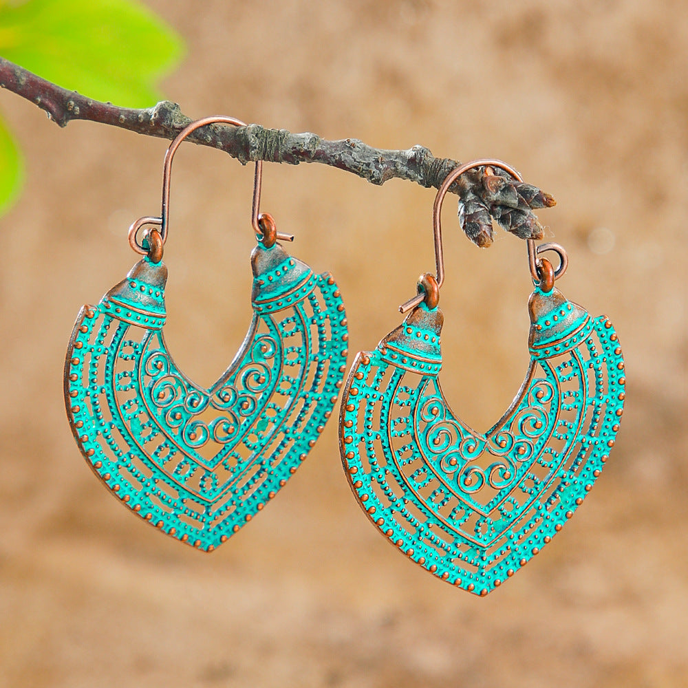 Wholesale Retro Bohemian Turquoise Heart Hollow Leaves Alloy Earrings for Party Wear Boutique Resale Jewelry