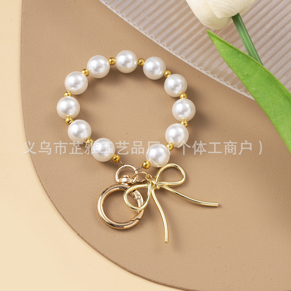 Wholesale Luxurious Resin Alloy Pearl Bow Keychains