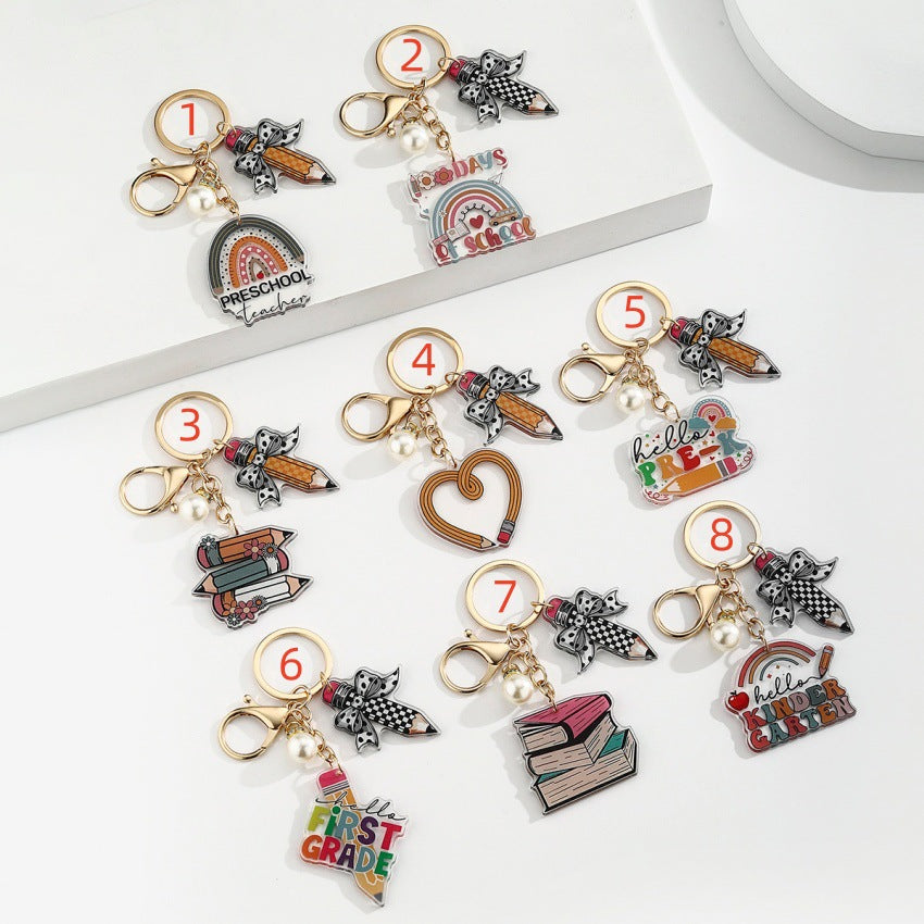 Wholesale Acrylic Book Pearl Letter Slogan Pencil Keychain