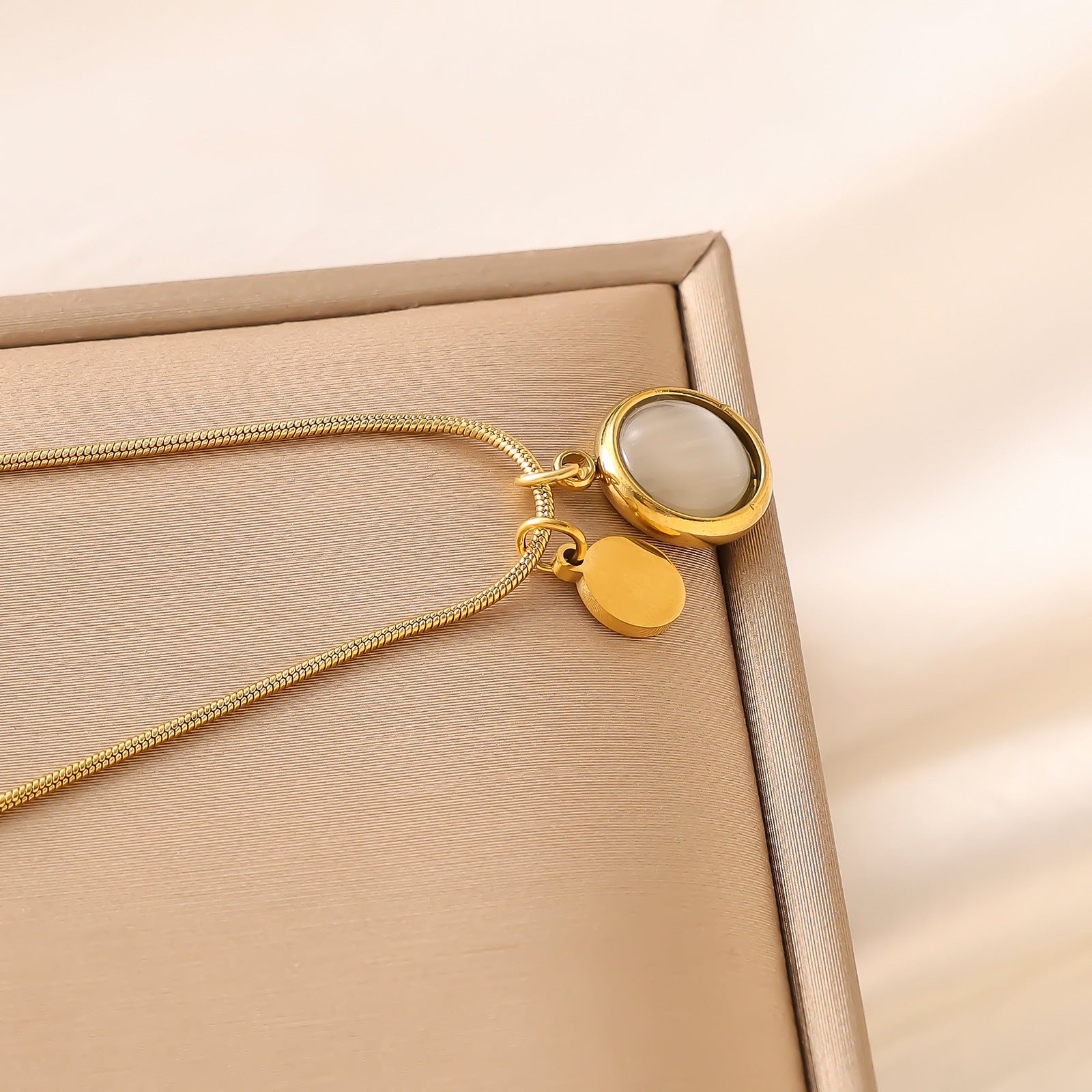 Wholesale Titanium steel cat' s eye necklace