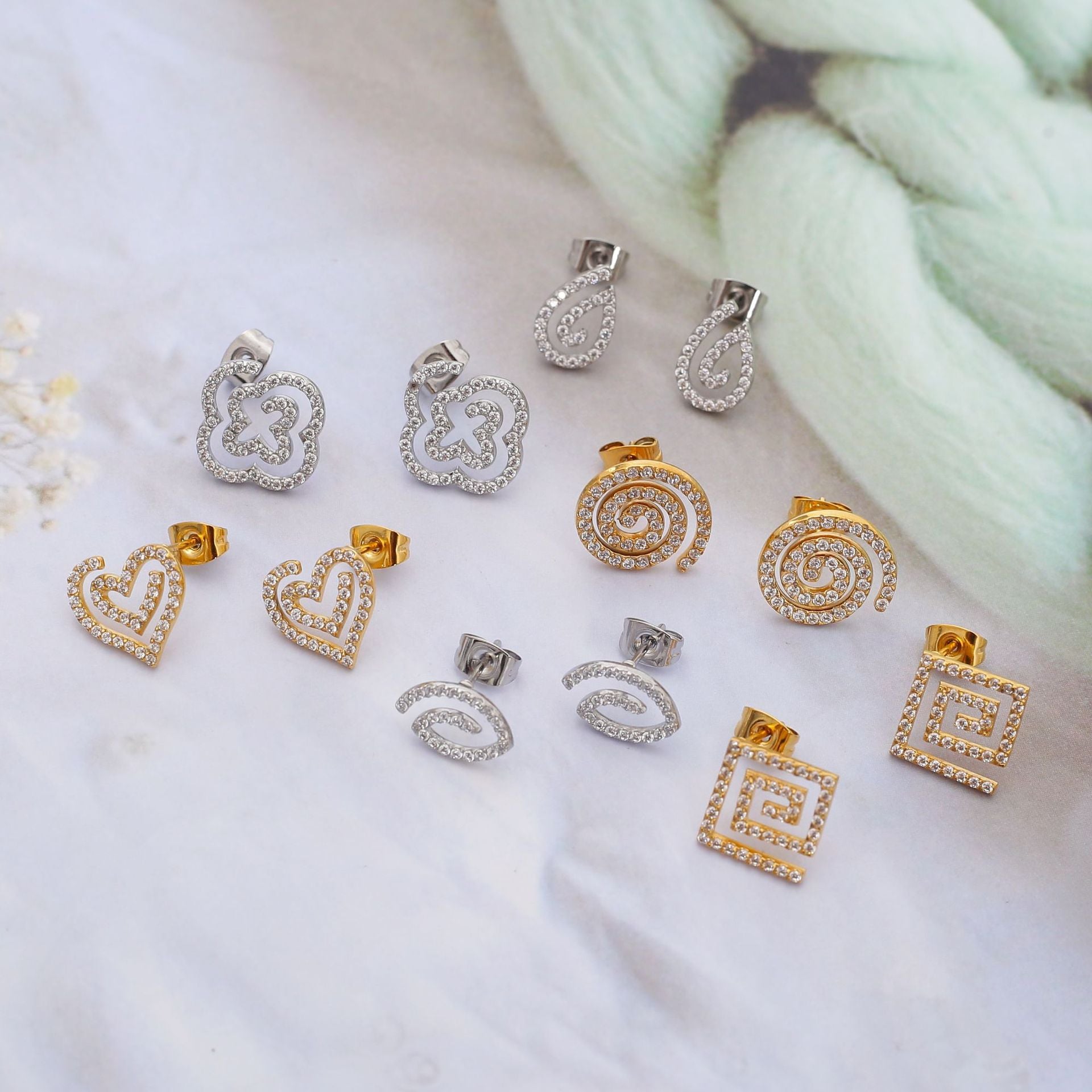 Wholesale Stainless steel earrings with zircon settings