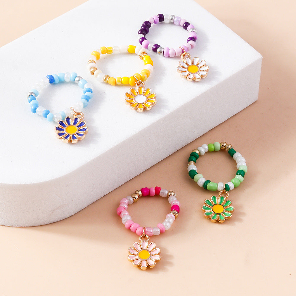 Wholesale flower ring boutique refined small rice bead ring