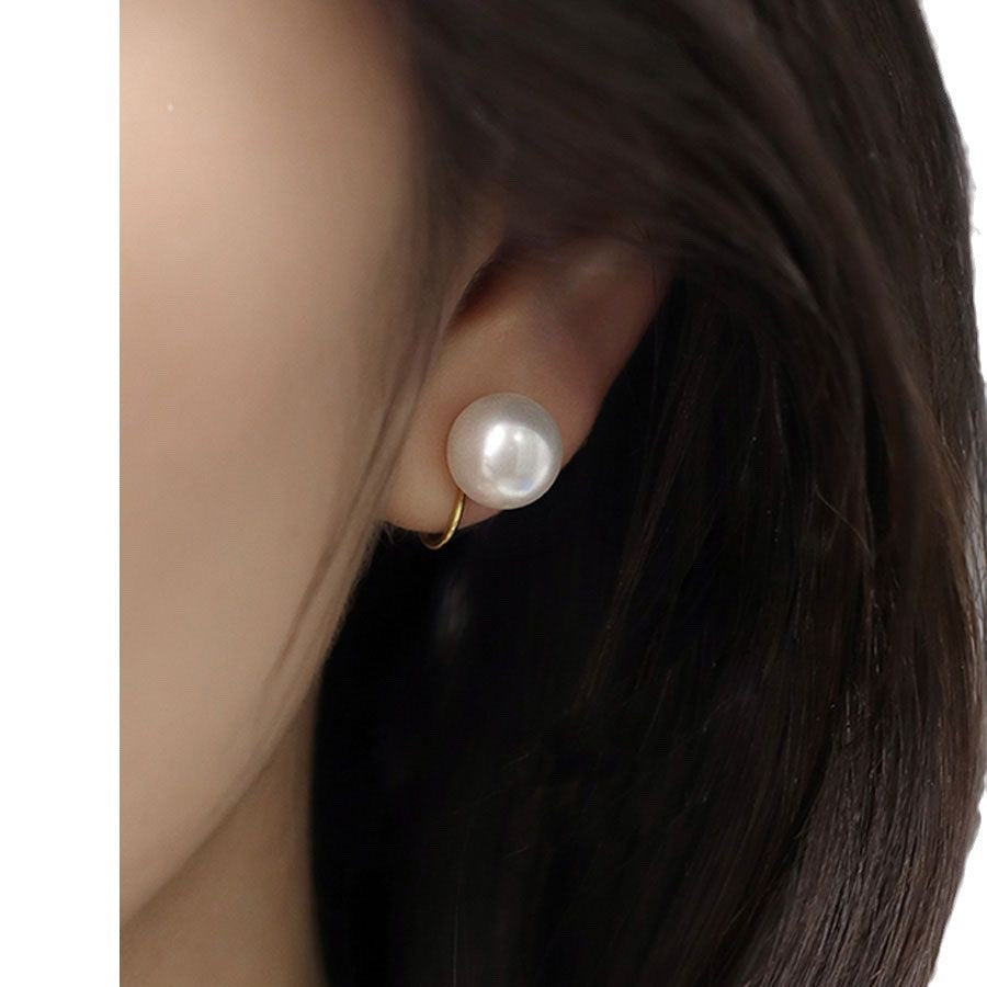 Wholesale big round pearl hollow mosquito coil ear clip earrings