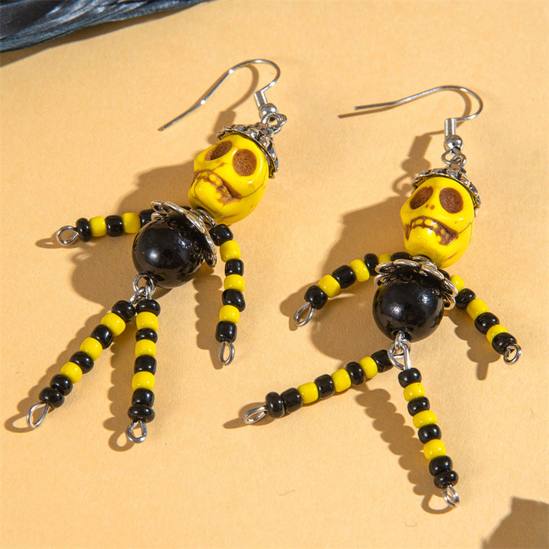 Pendientes retro y coloridos al por mayor Serie de Halloween Pendientes colgantes de borla del cráneo