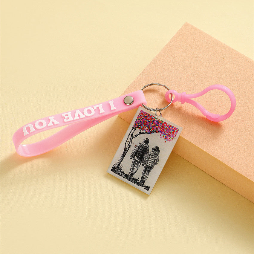 Wholesale English placard couple keychain