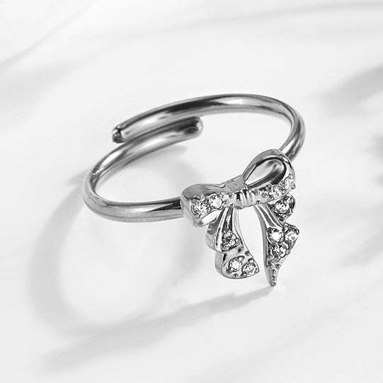 Wholesale 2PCS Steel-titanium bow zircon ring adjustable