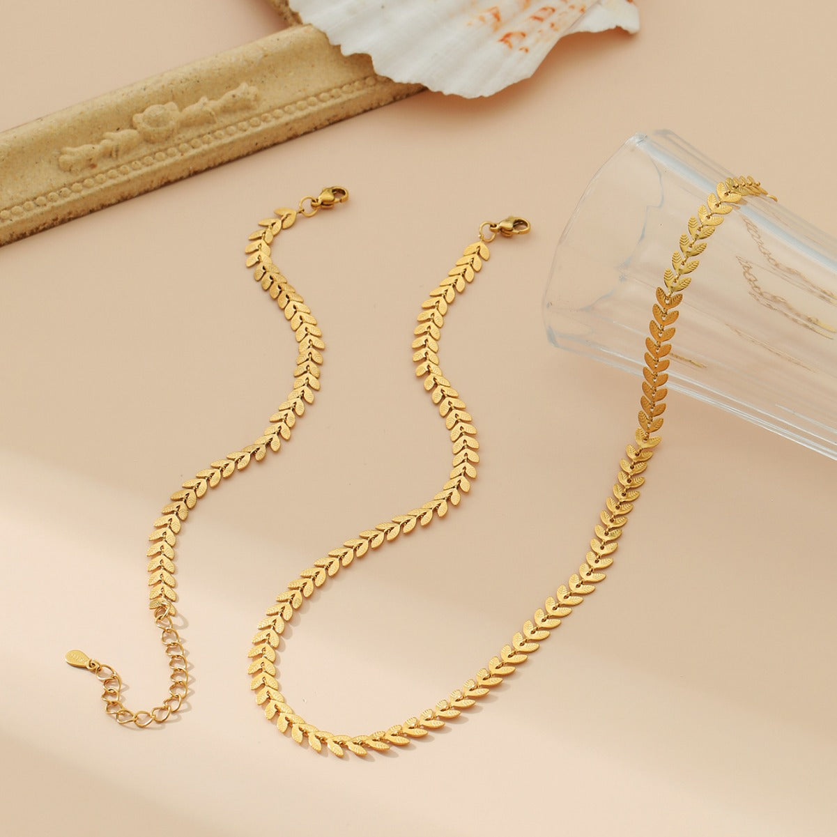 Wholesale stainless steel 18k gold rice ear simple necklace bracelet suit