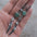 Wholesale Green stone earrings punk cross feather metal pendant tassel earrings