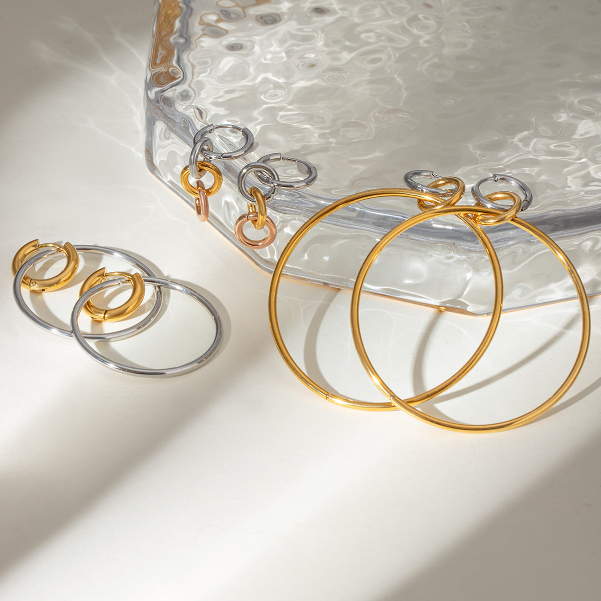 Wholesale 18k gold stainless steel gold and silver color matching steel hoop earrings