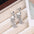 Wholesale Real Gold Silver Needle Zircon Letter Pearl Earrings