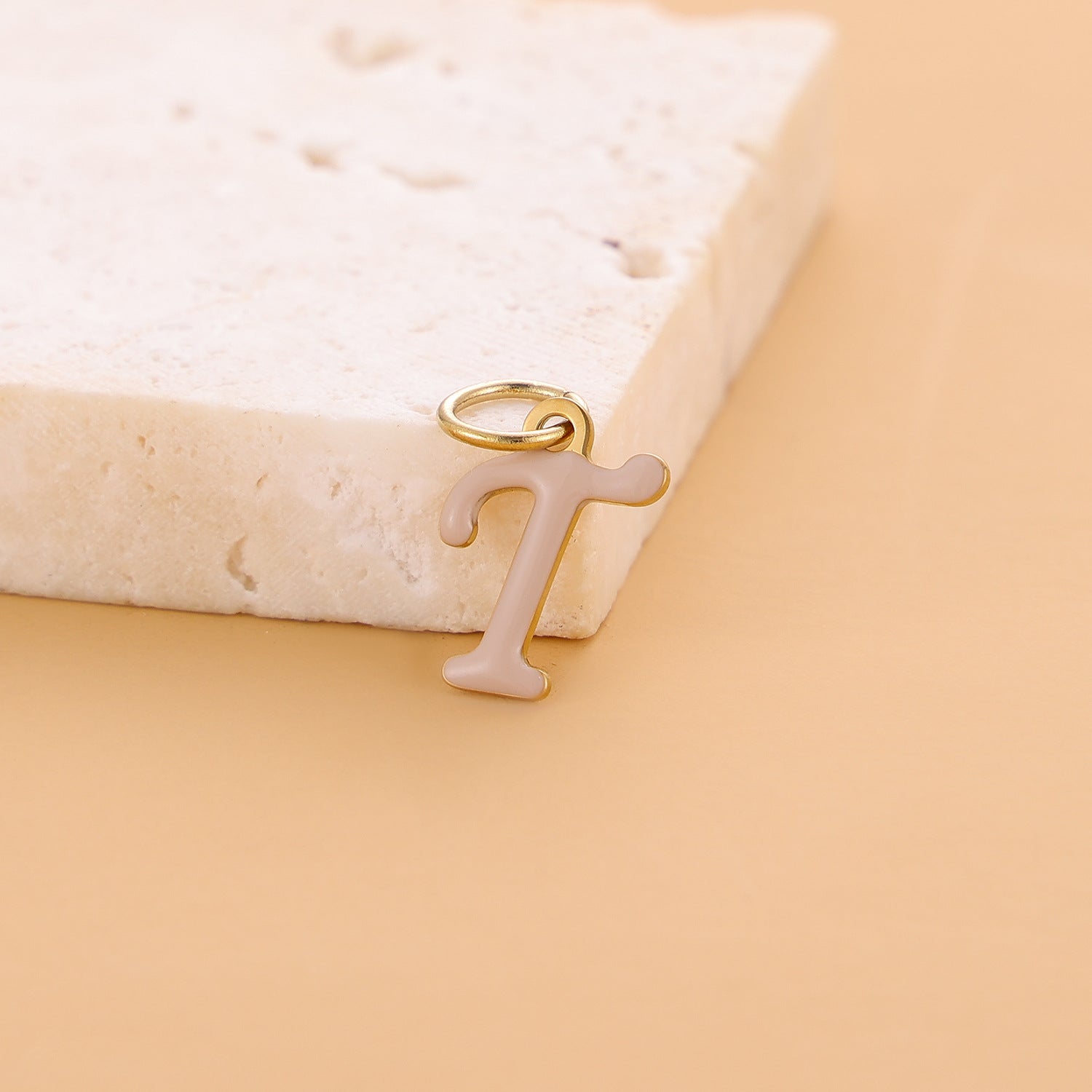 Wholesale Colorful 26 English letter pendant oil drop titanium steel vacuum plating pendant