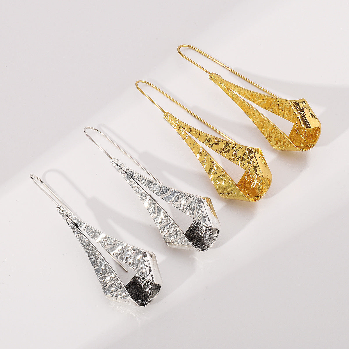 Wholesale geometric irregular twist earrings hollow metal exaggerated earrings