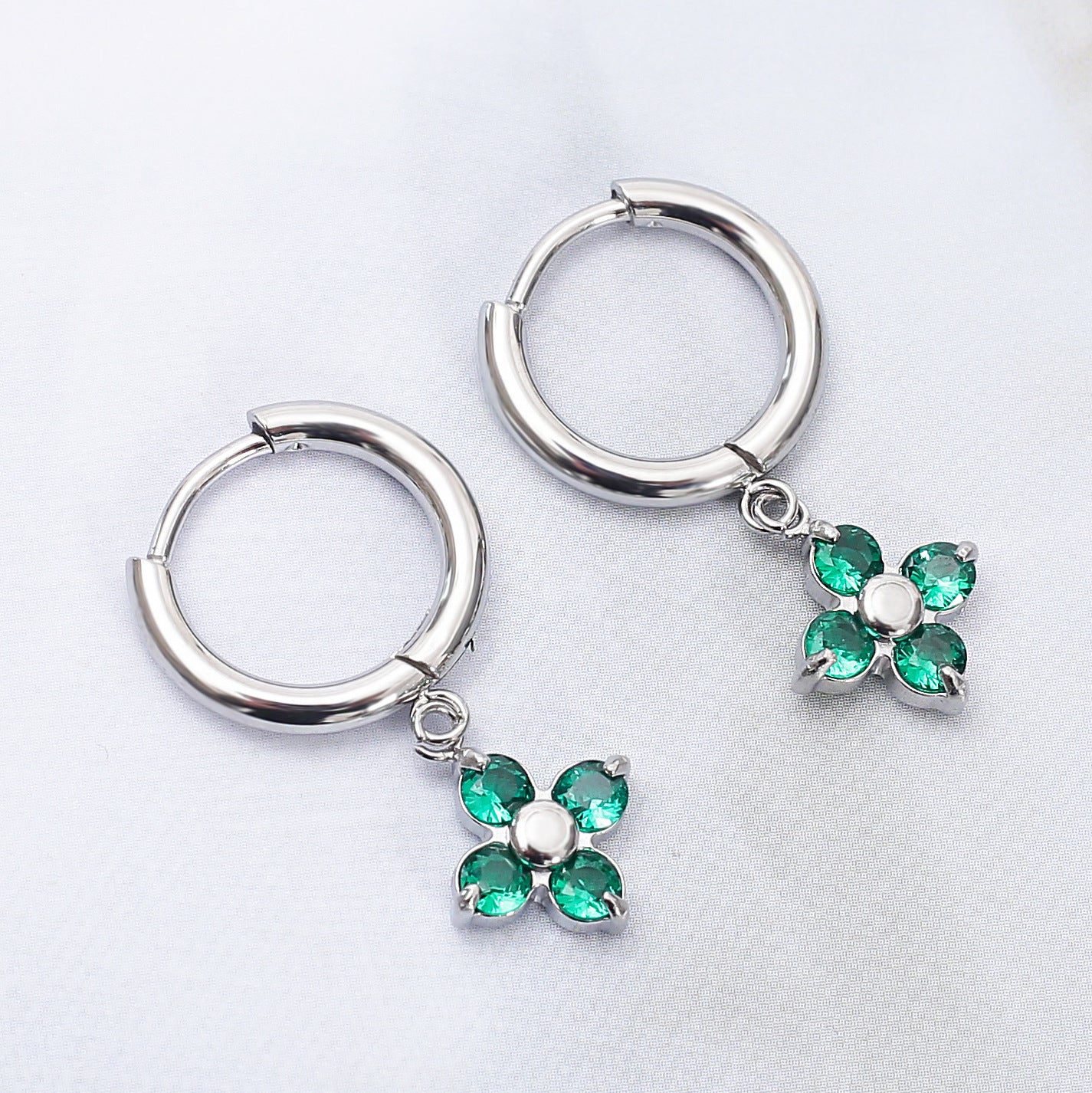Wholesale Stainless steel flower earrings with zircon inlay