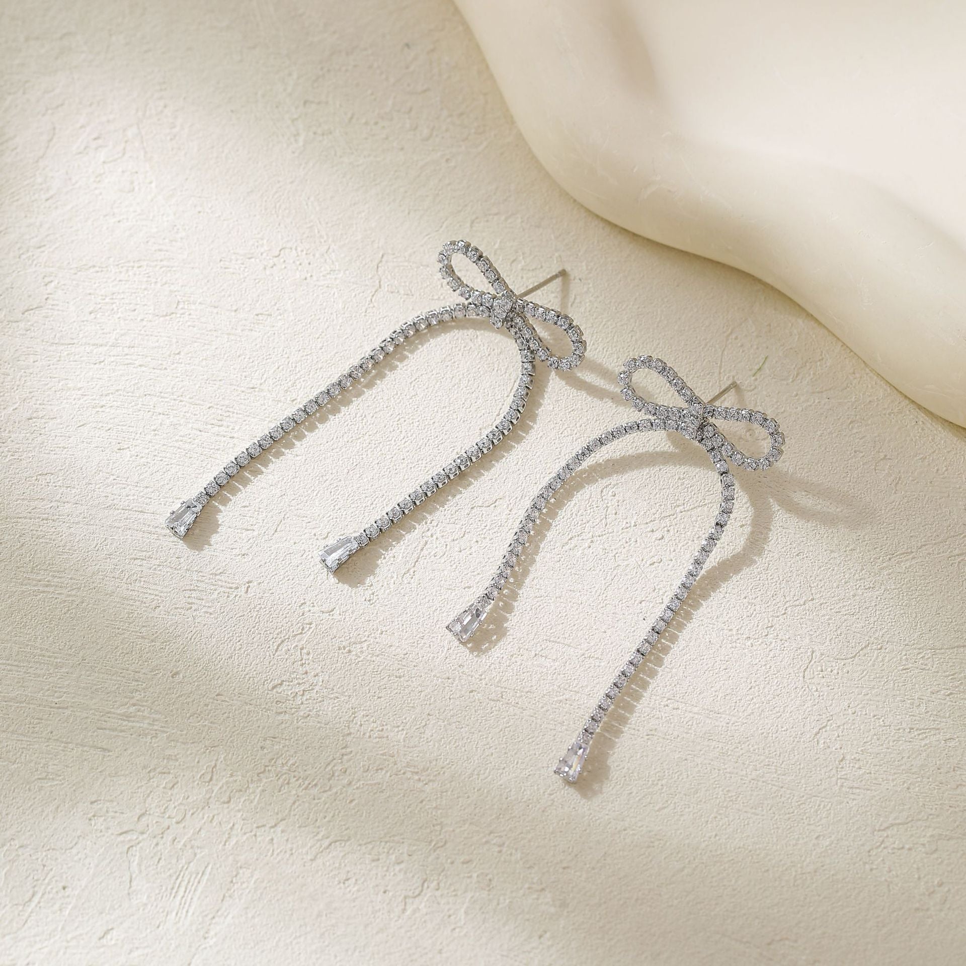 Wholesale Metal Bow Tassel Earrings