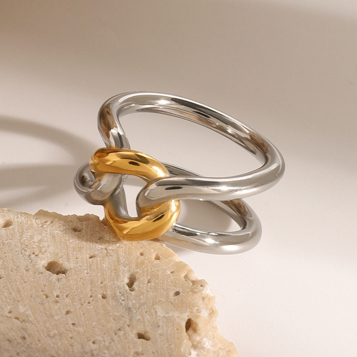 Wholesale 18k stainless steel gold and silver color matching design sense knot hollow color matching ring