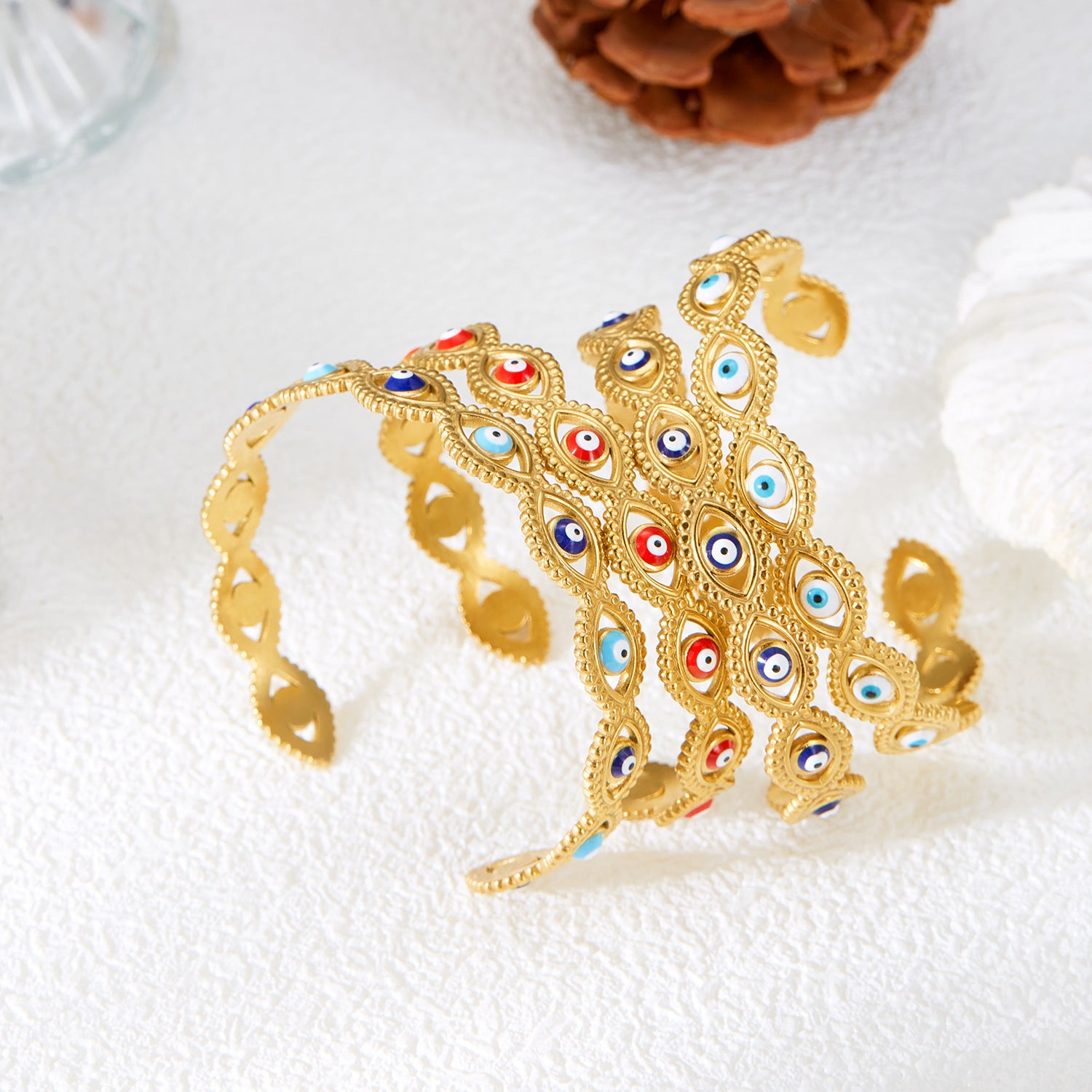 Wholesale Hollow Oil Dropping Blue Eyes Stainless Steel Bracelet