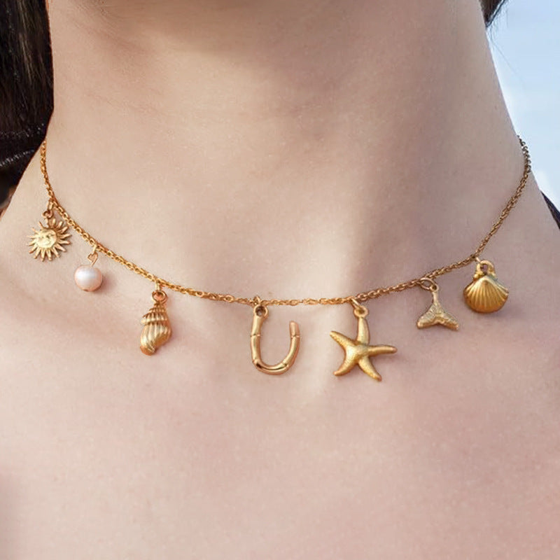 Wholesale Bohemian Shell Starfish Gold Electroplated Copper Alphabet Pendant Necklace for Women Fashion Accessory
