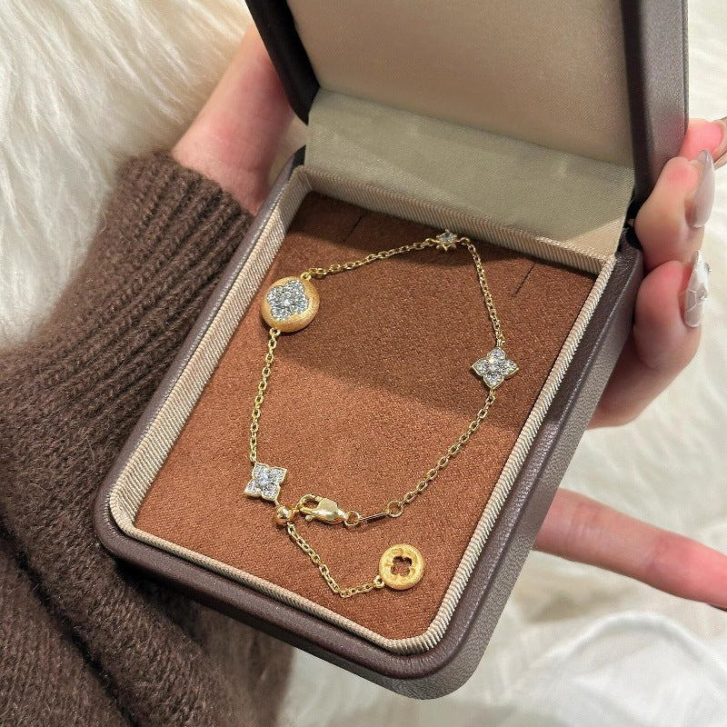 Wholesale Medium style four-leaf flower bracelet earrings set