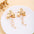 Wholesale Retro Flower Pearl Hollow Love Light Luxury Earrings