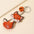 Wholesale cartoon fox pu inflatable cotton boll keychain