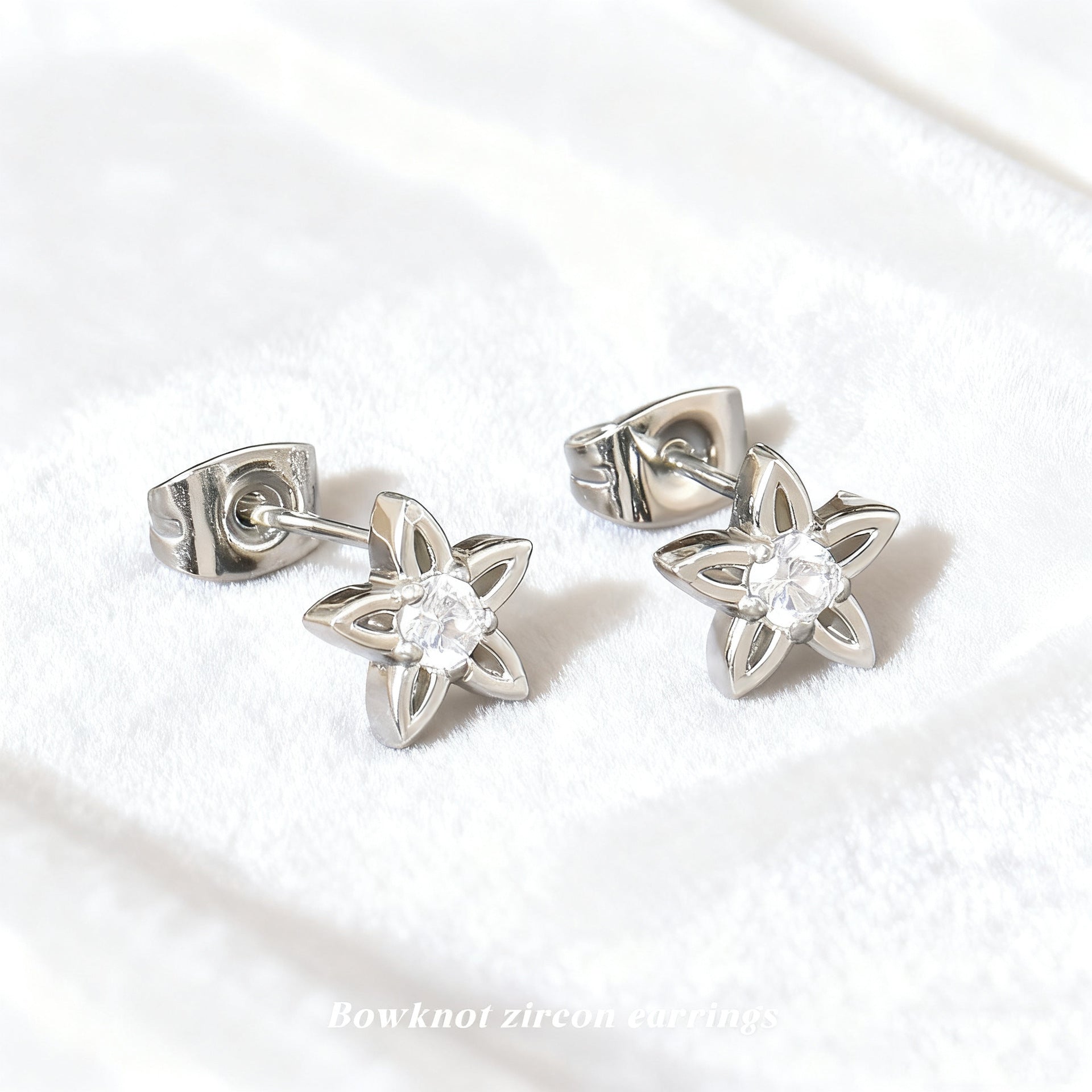 Wholesale Titanium steel zircon flower earrings