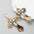Wholesale Leopard Leather Cross Alloy Inlaid Turquoise Exaggerated Earrings