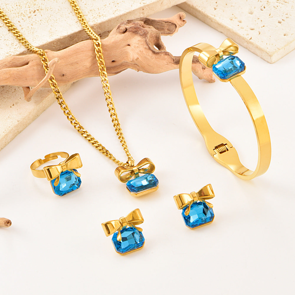 Wholesale Stainless Steel Bow Rhinestone Necklace,  Bracelet,  Earrings,  and Ring Set