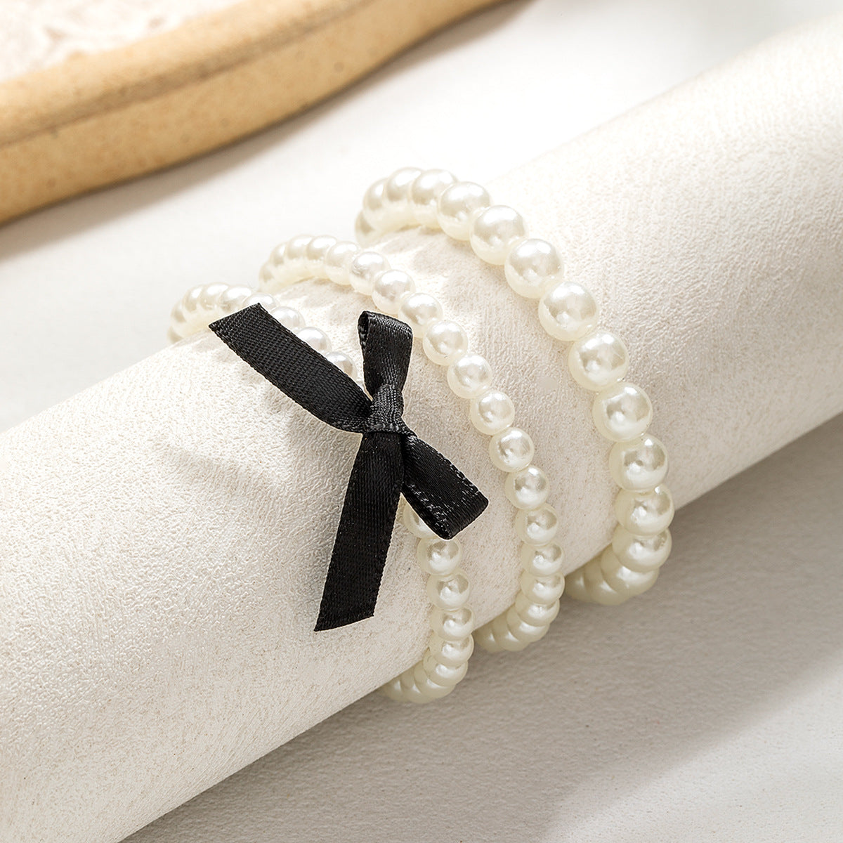 Wholesale Bow-knot pearl beaded stretch bracelet