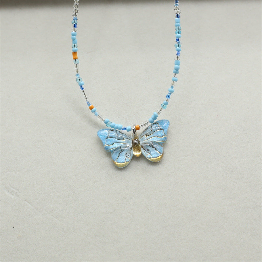 Wholesale gradient color bronzing butterfly sweet pendant rice beads beaded necklace