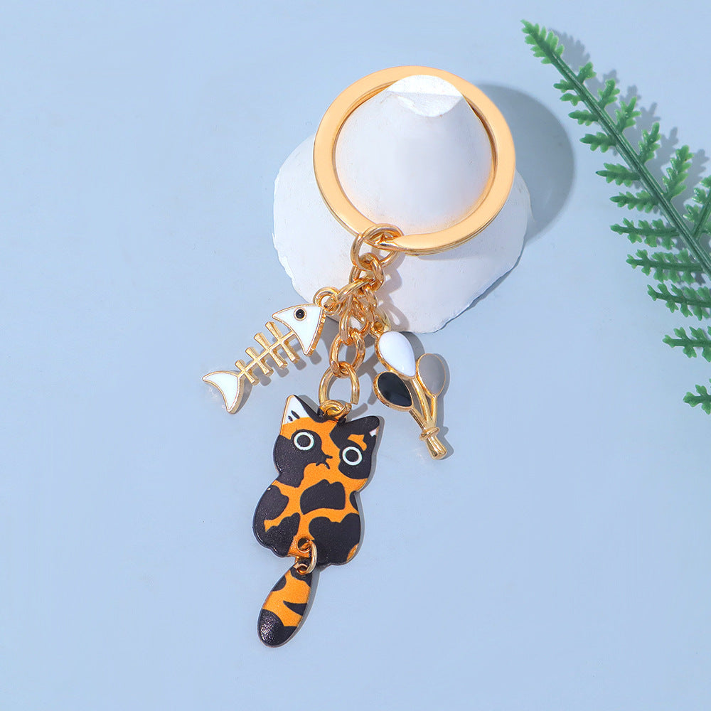 Wholesale Zinc Alloy Cartoon Cat Keychain With Movable Tail Trendy Animal Design Bag Charm Or Car Key Accessory Electroplated Finish Fashion Accessory For Gift And Boutique Resale