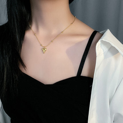 Wholesale snake bone chain heart necklace