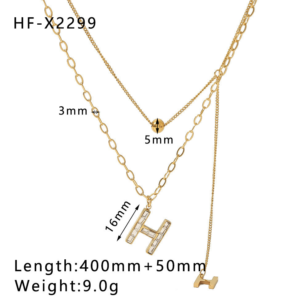 Wholesale stainless steel bamboo love fishtail skirt letter zircon necklace