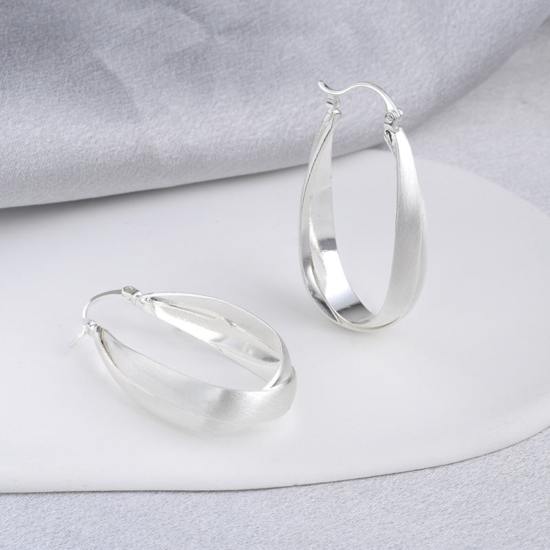 Wholesale retro metal frosted brushed earrings