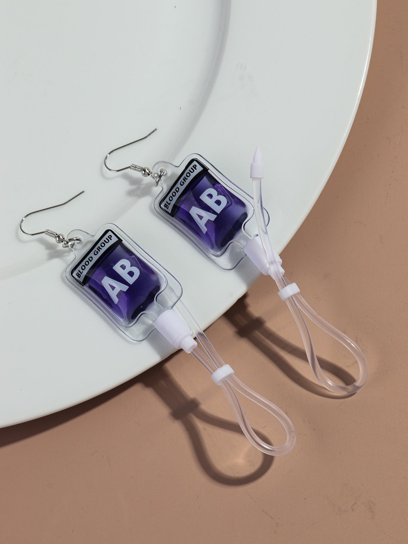 Wholesale creative plasma blood bag earrings