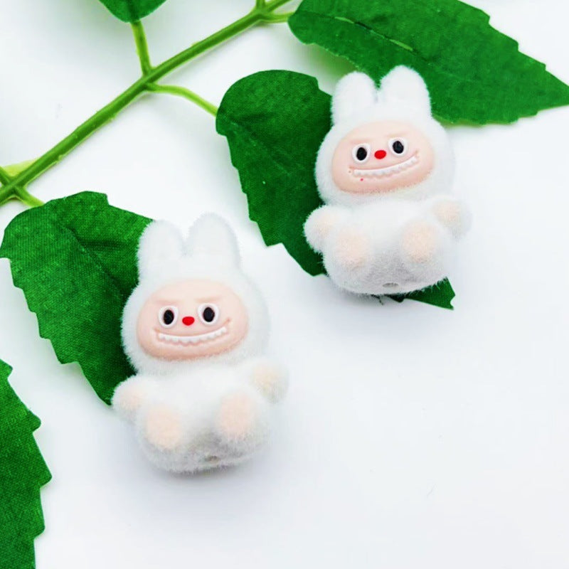 Wholesale 10pcs cartoon flocking sitting doll with beads