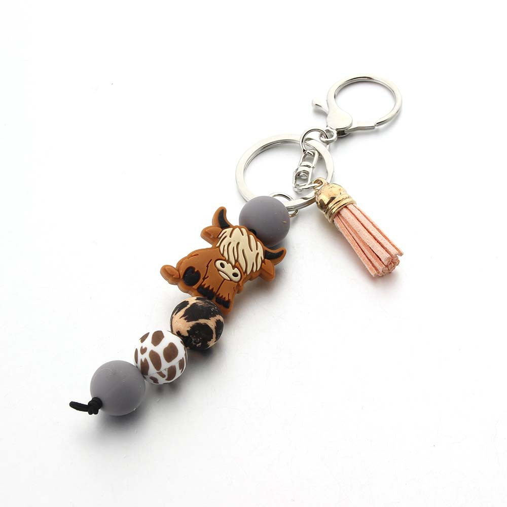 Wholesale Cartoon Cow Teeth Silicone Bead Keychain