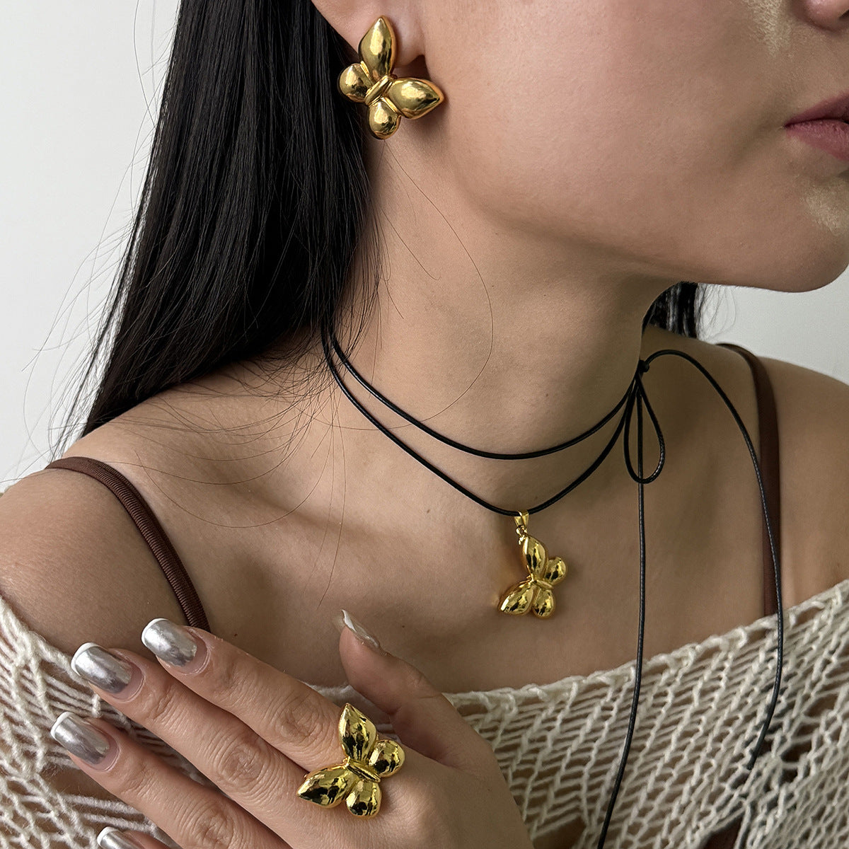 Orecchini a farfalla all'ingrosso Stessa collana di cera Anello in lega tutto-fiammifero