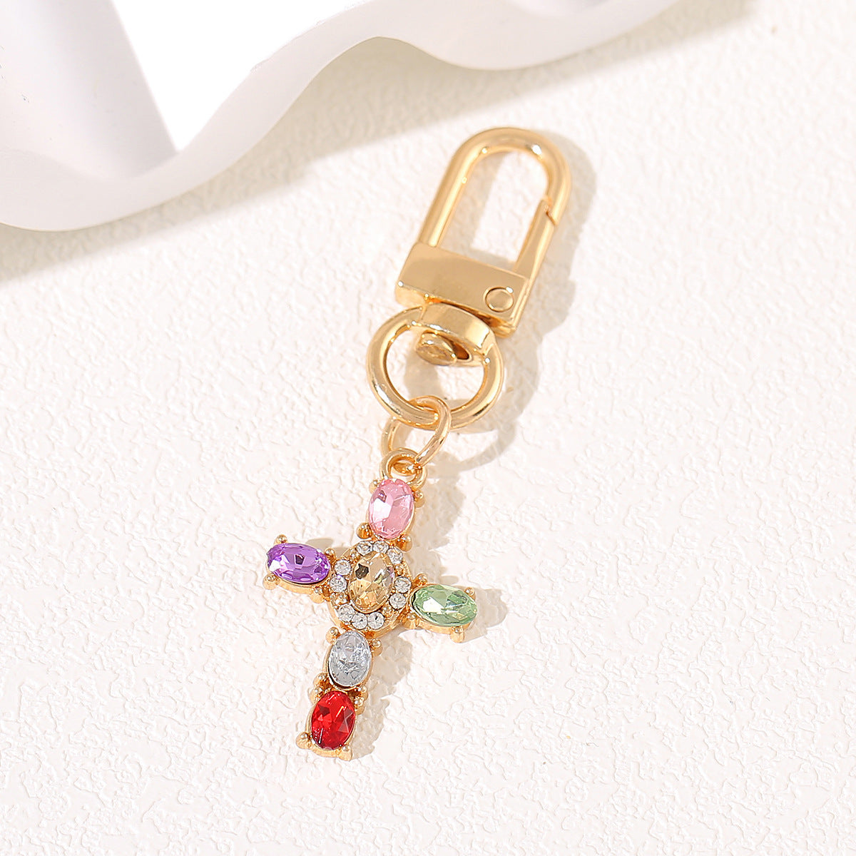 Wholesale Alloy cross-shaped keychain pendant with rhinestones