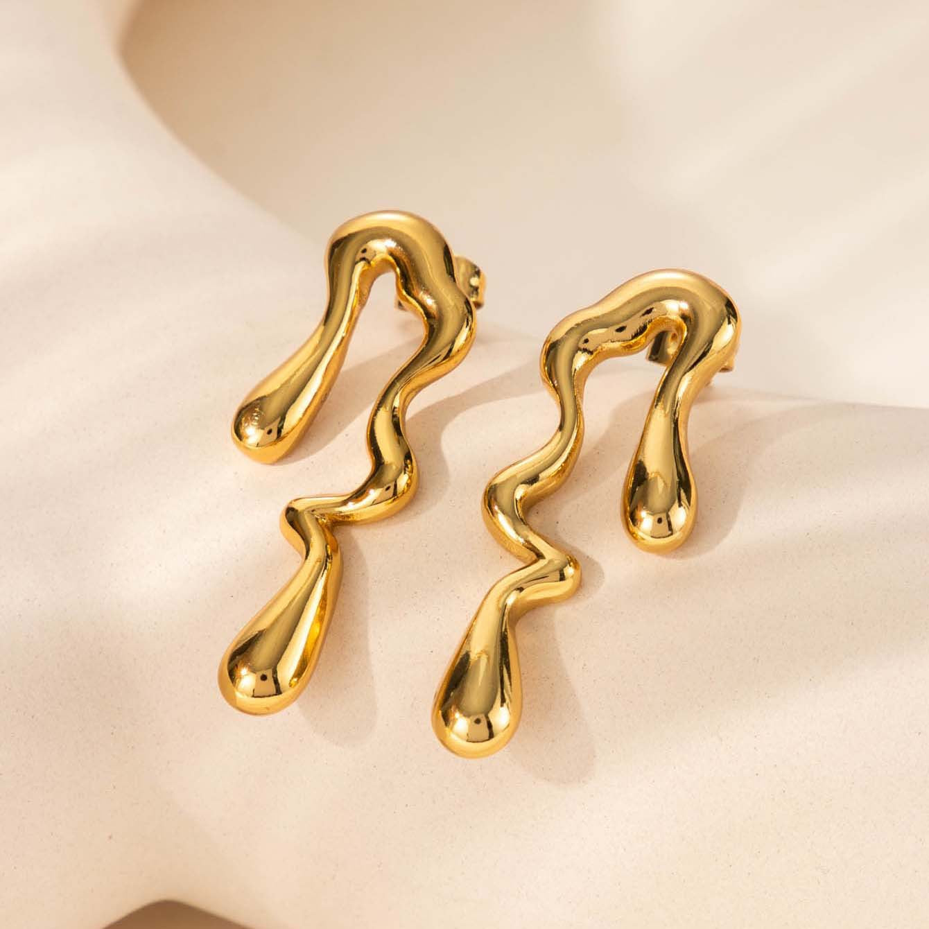 Wholesale  irregular drop-shaped love titanium steel liquid high-grade temperament  light luxury earrings